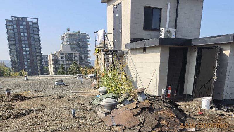 Tar and gravel flat roof before replacement, mid-rise building, West End, Vancouver, A&W Roofing Ltd