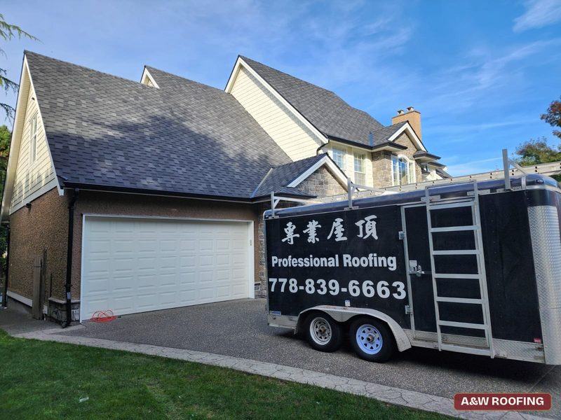 A&W Roofing Ltd trailer on site at a completed South Surrey roof replacement